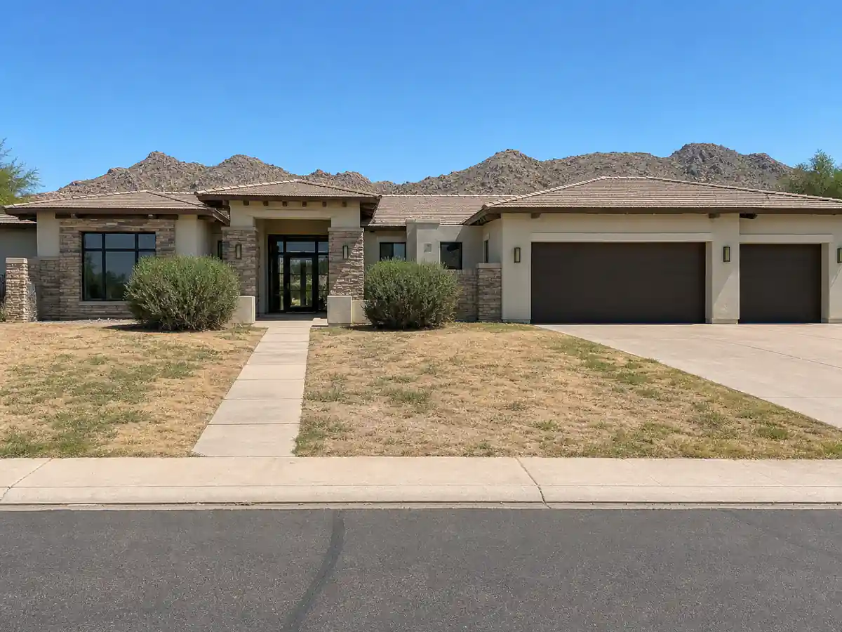 Concept view of a Scottsdale home before conversion, with a patchy lawn front yard and a plain concrete walkway